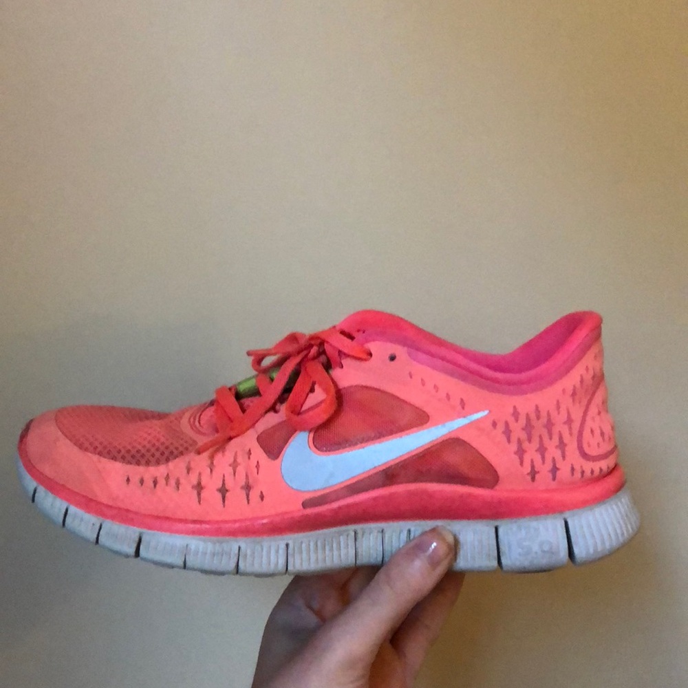Pink Nike running sneakers